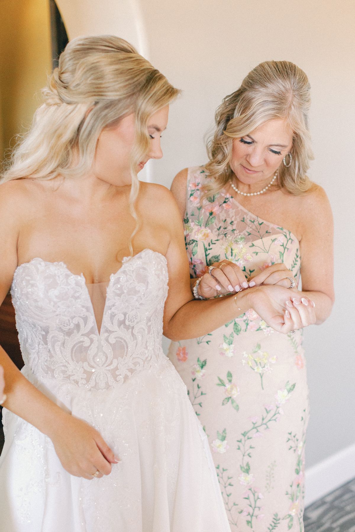 Mom putting on bracelet