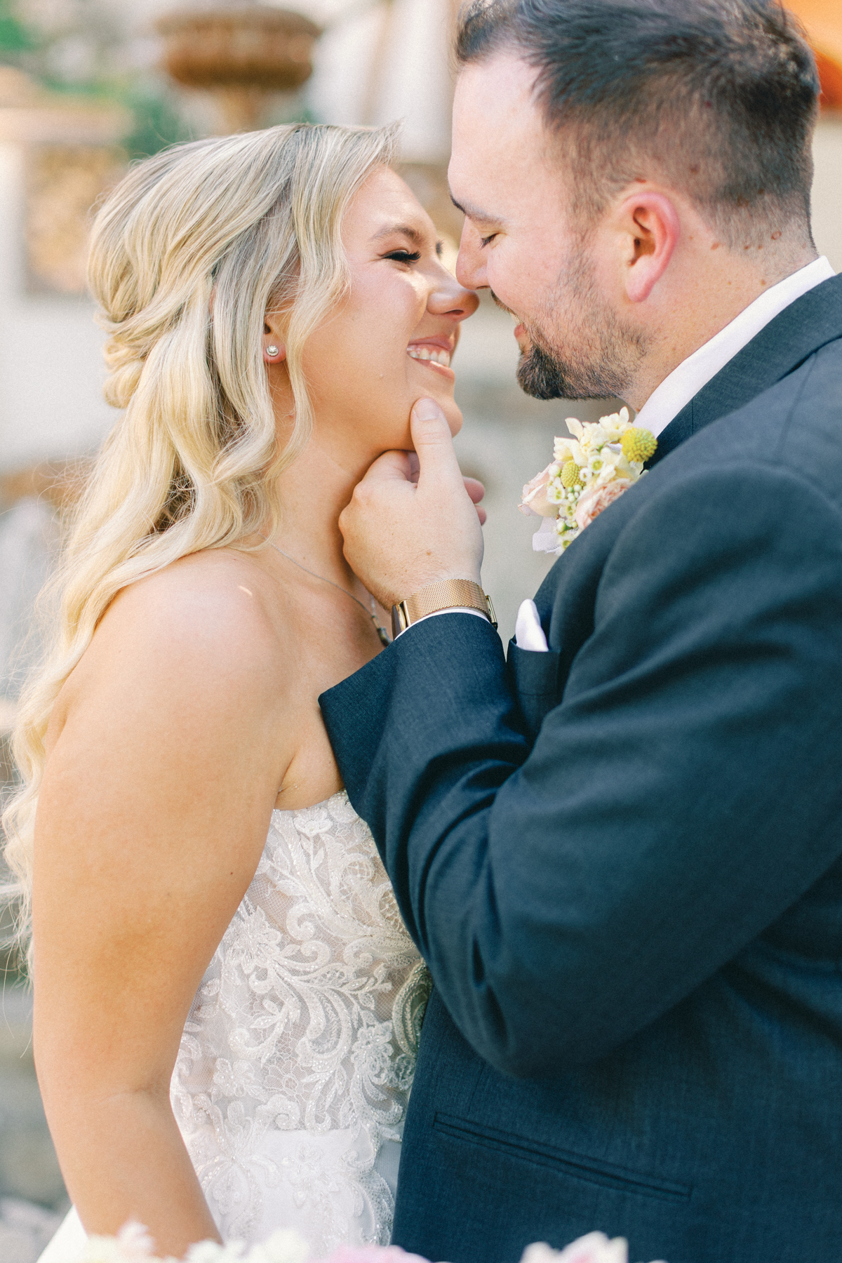 Bride and groom, almost kiss, kissing up close