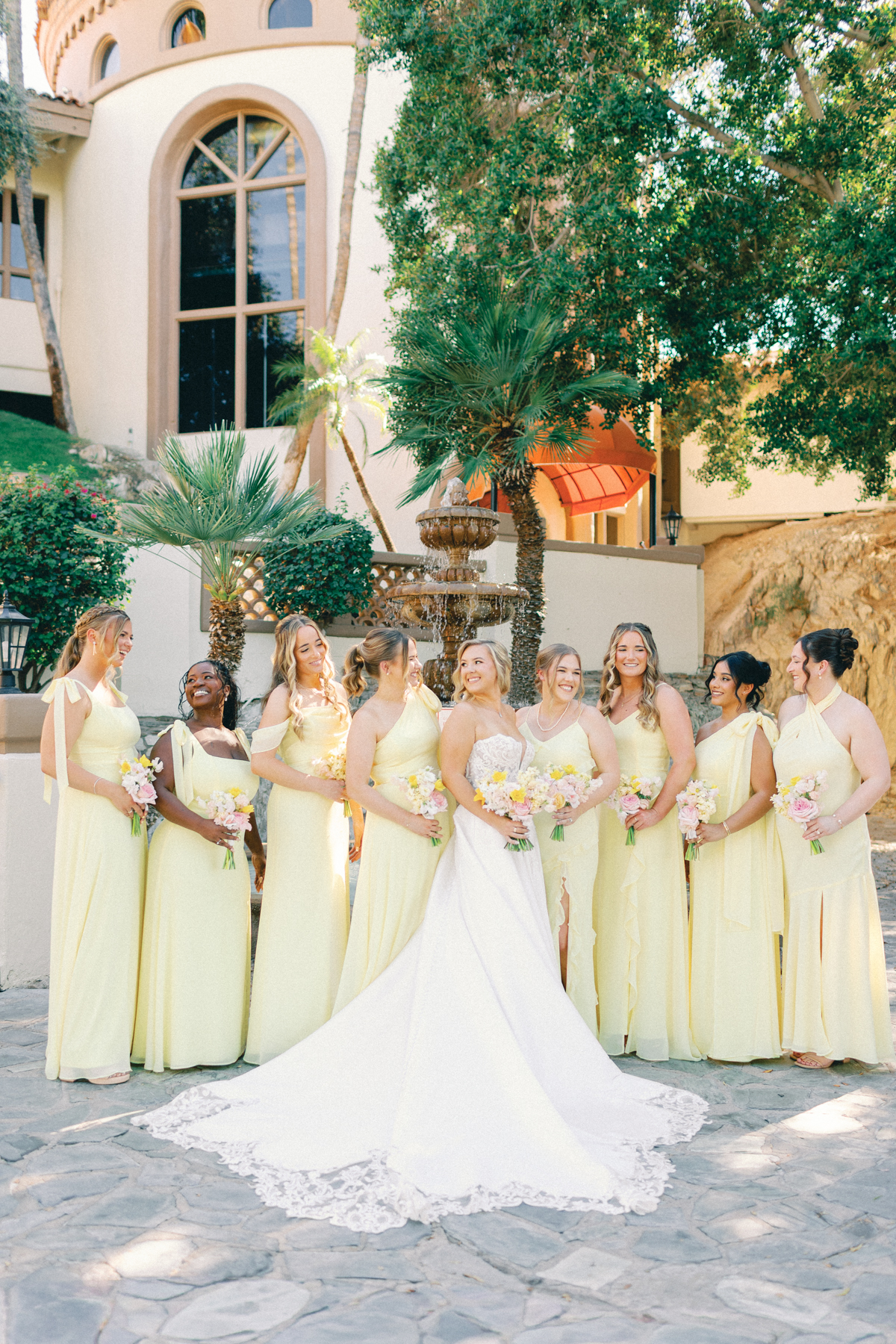 Bridesmaids and bride laughing