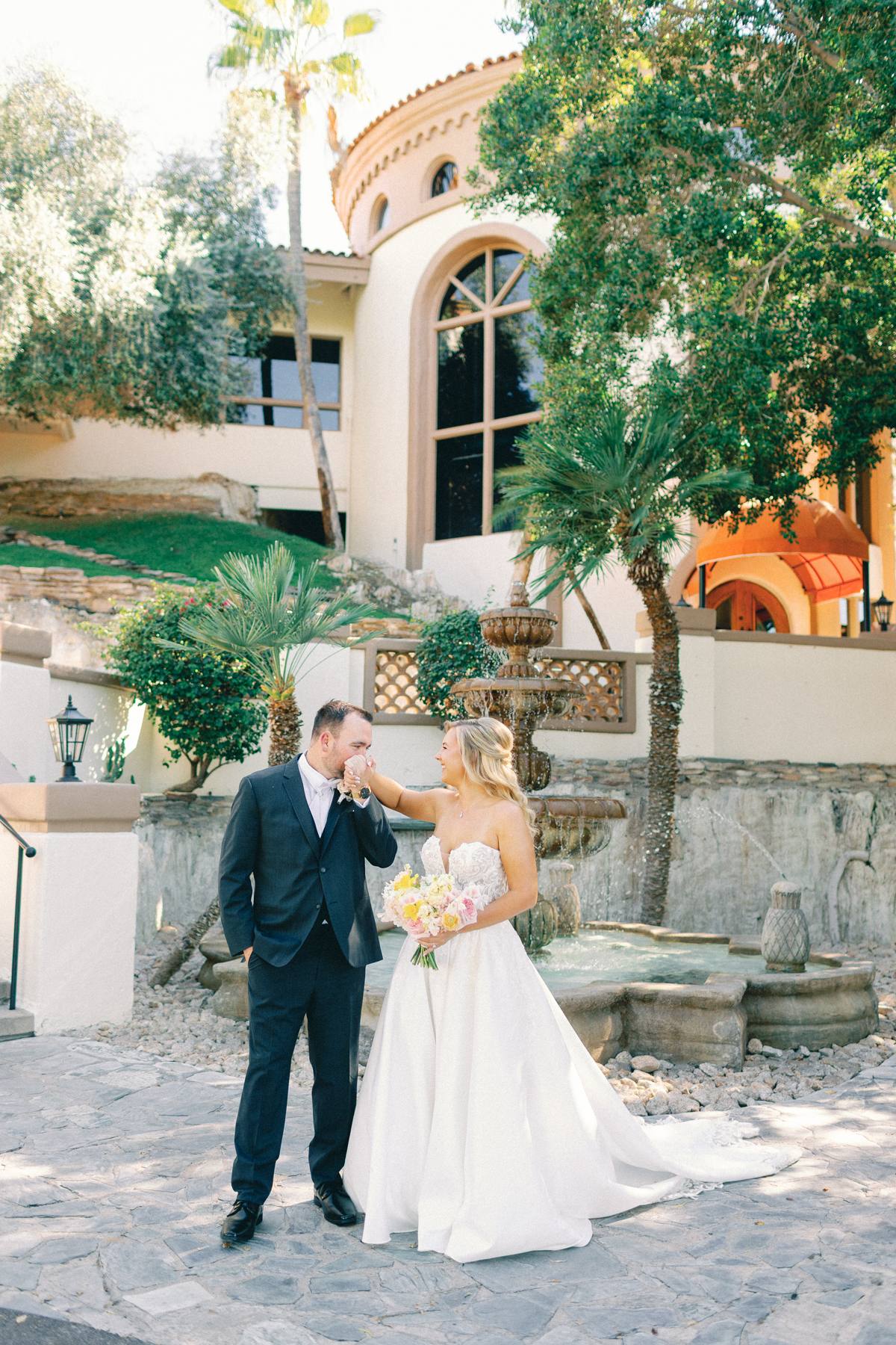 (groom) kissing bride hand