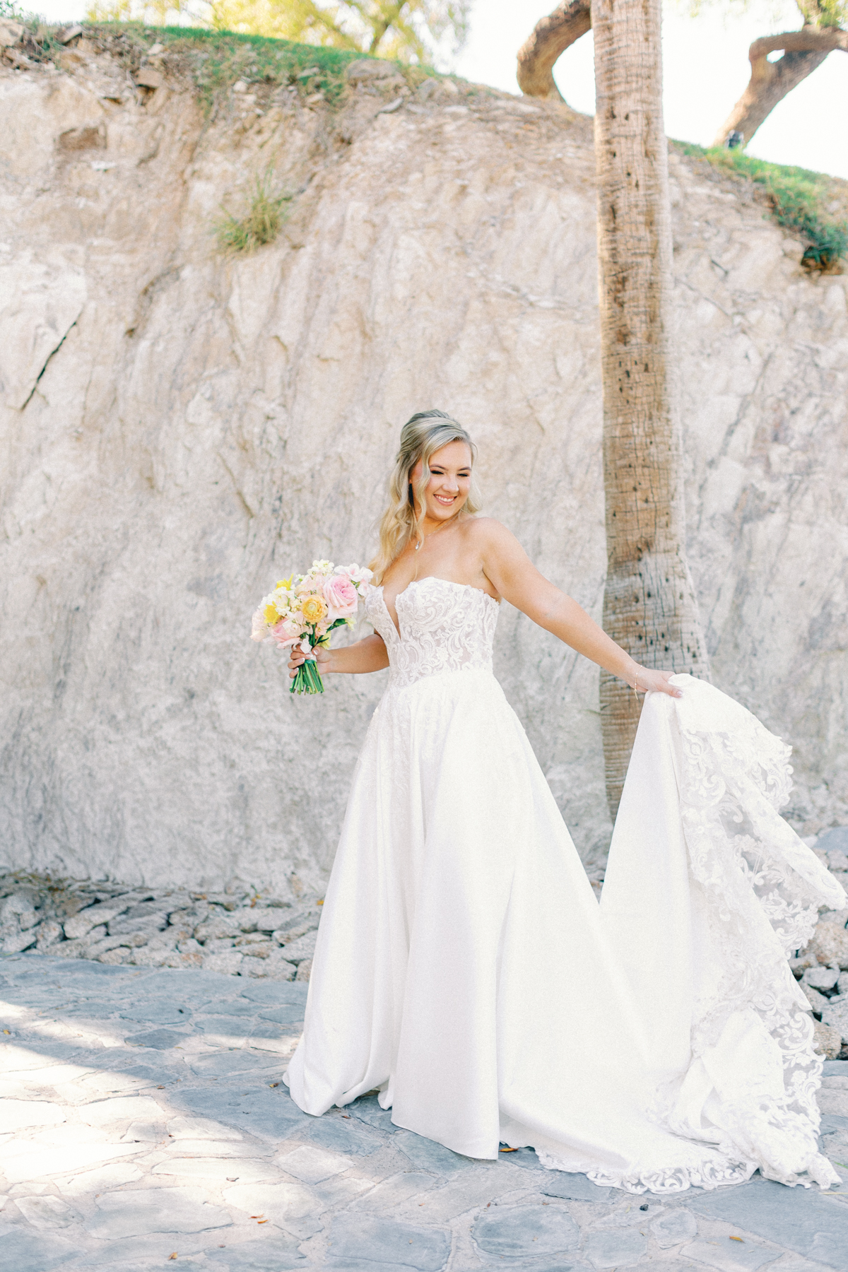 Bridal portrait, playing with dress train
