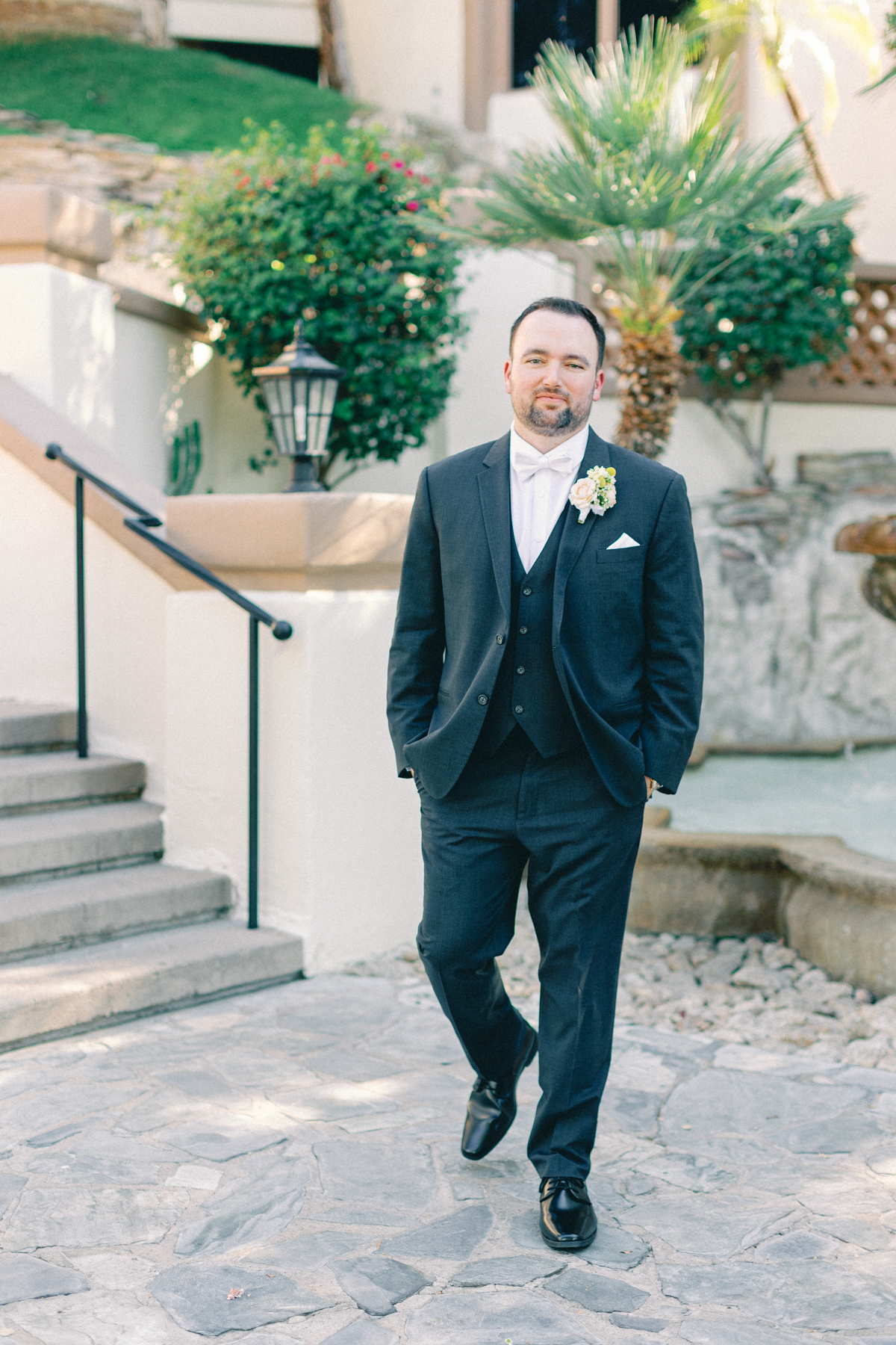 (groom) walking towards camera