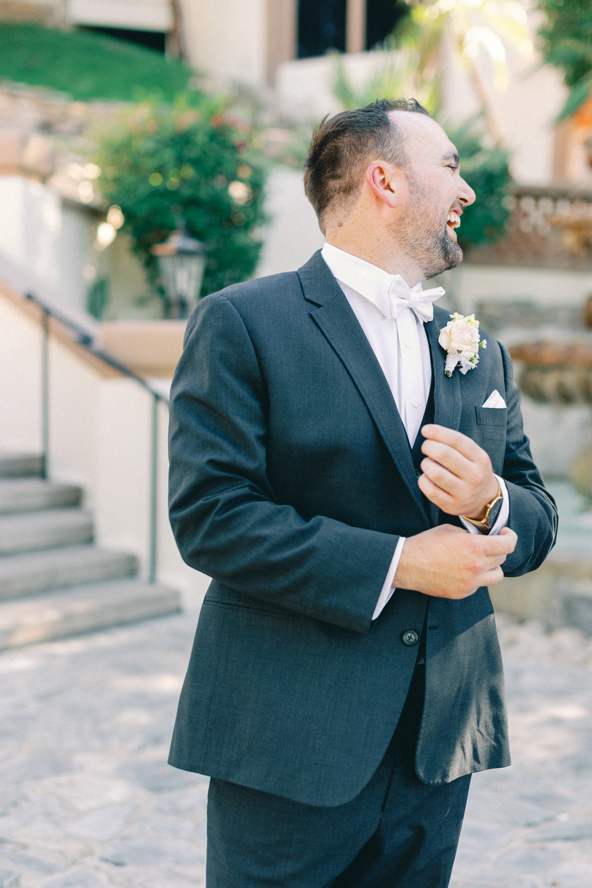 (groom) laughing