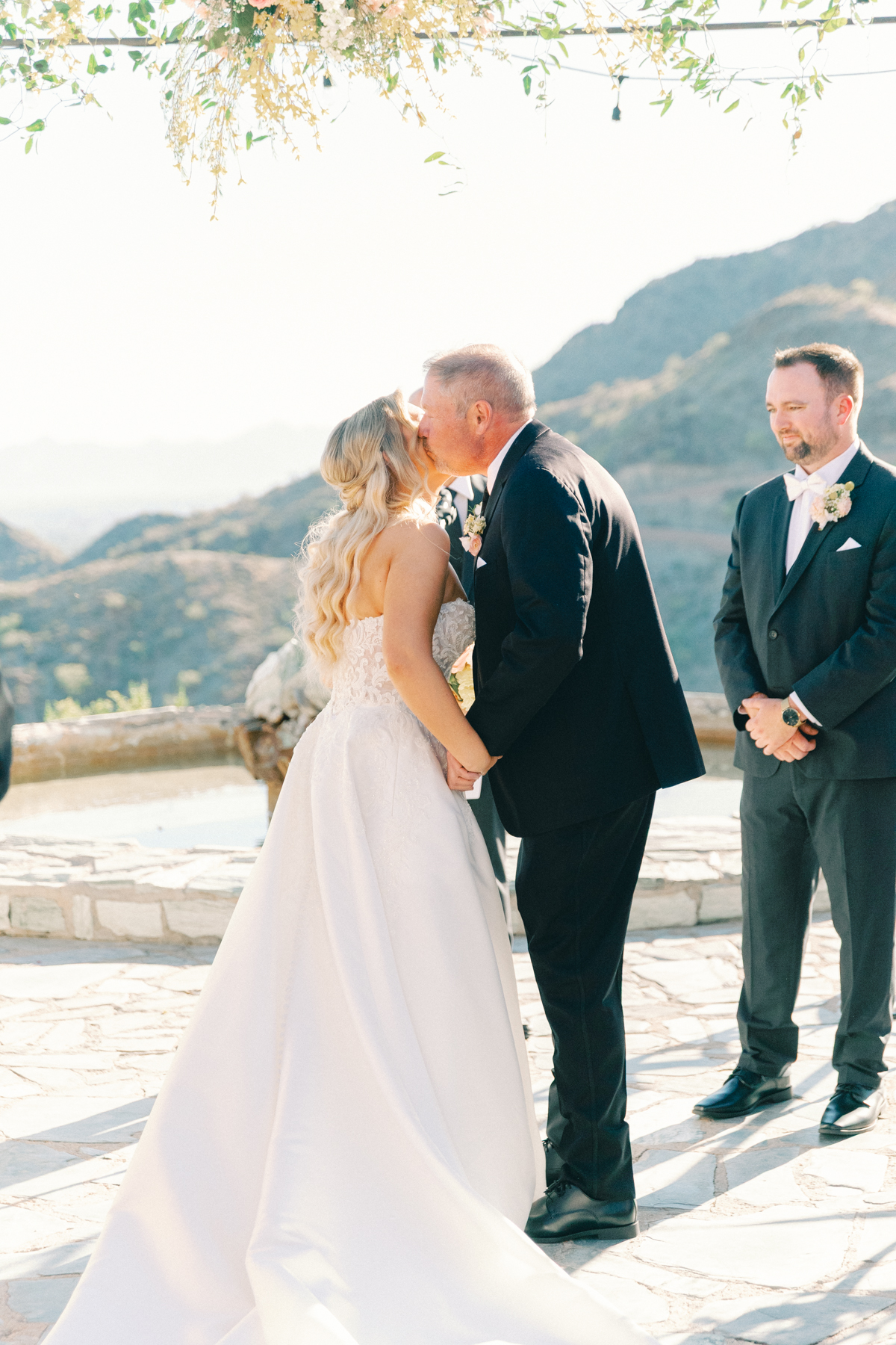 Father of the bride giving her away