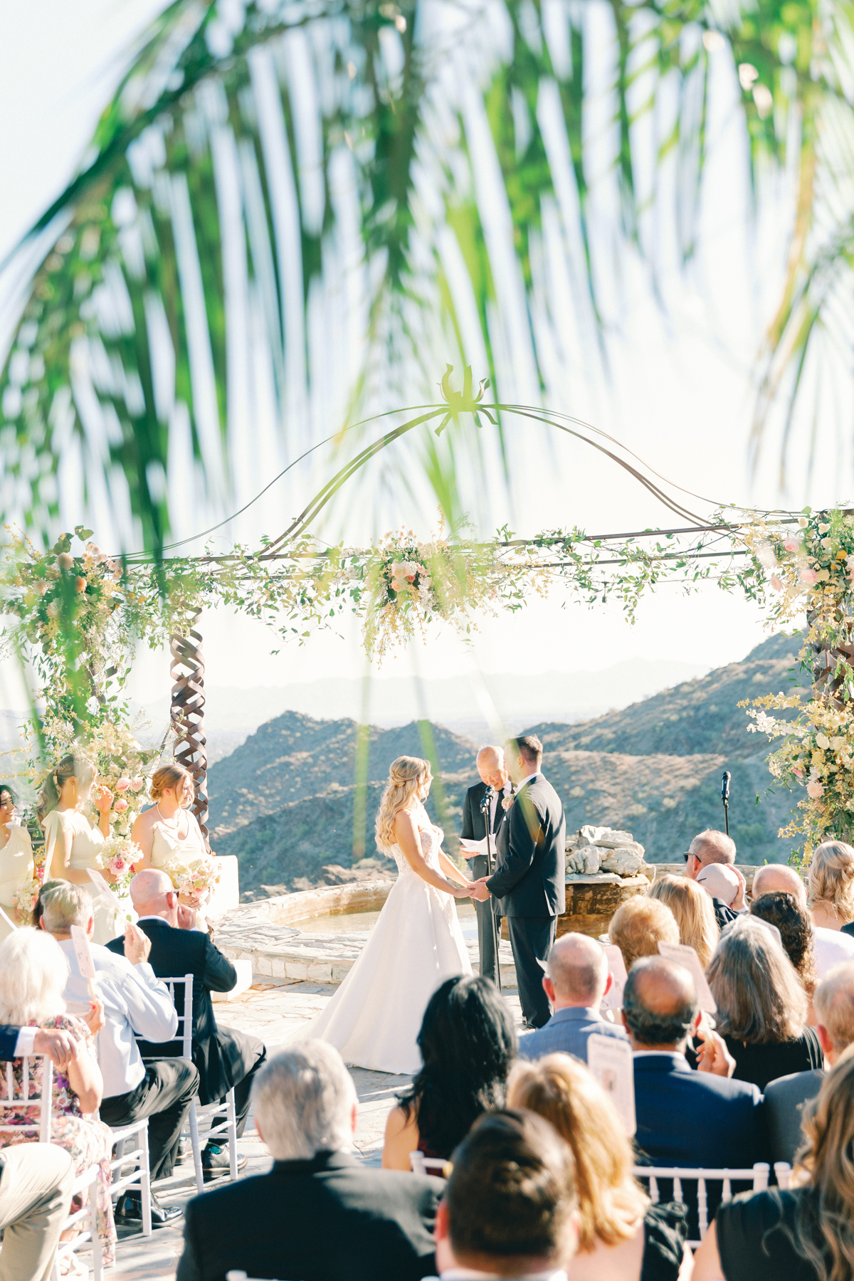Bride and (groom) looking at each other at ceremony