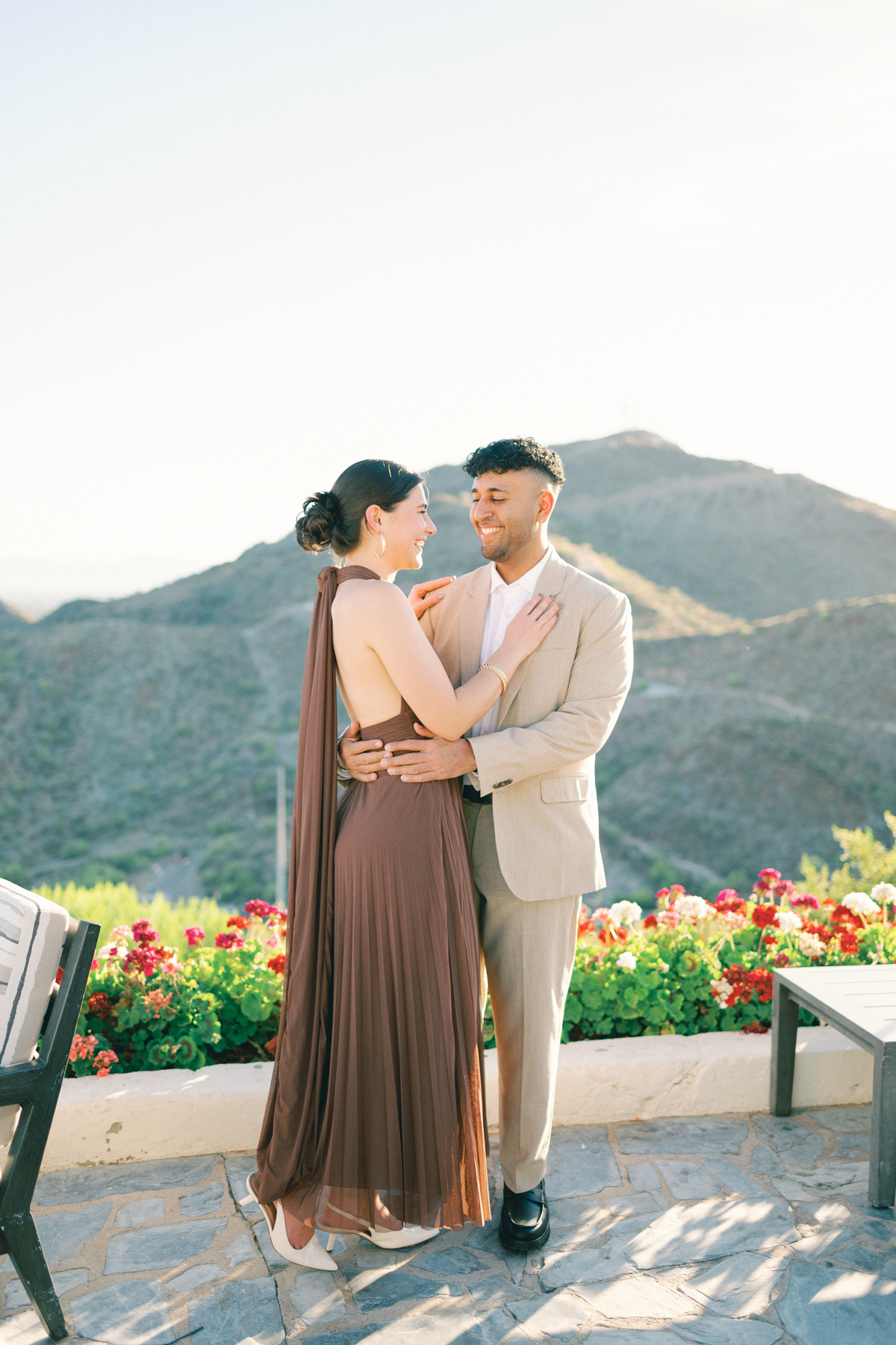 Cocktail hour portrait a couple laughing