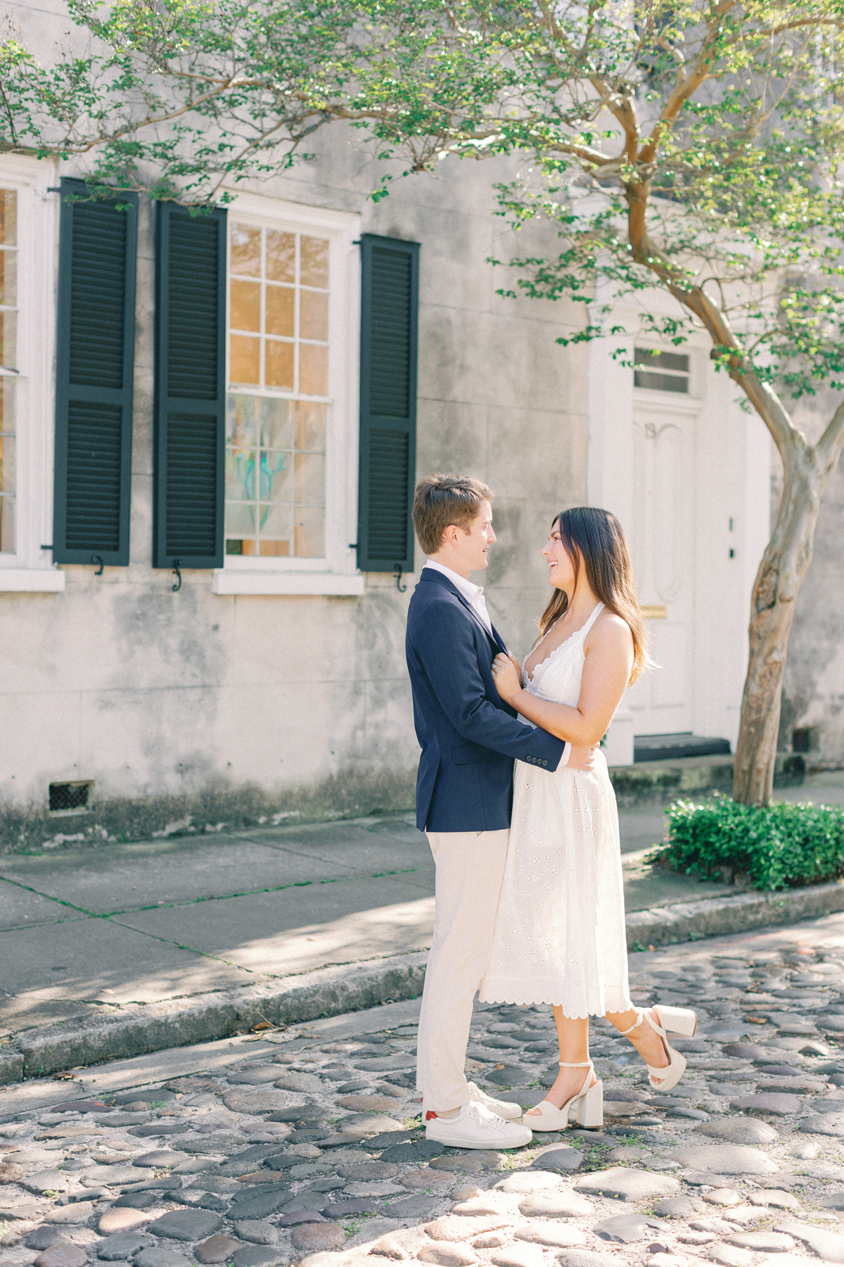 Couple facing each other on cute street