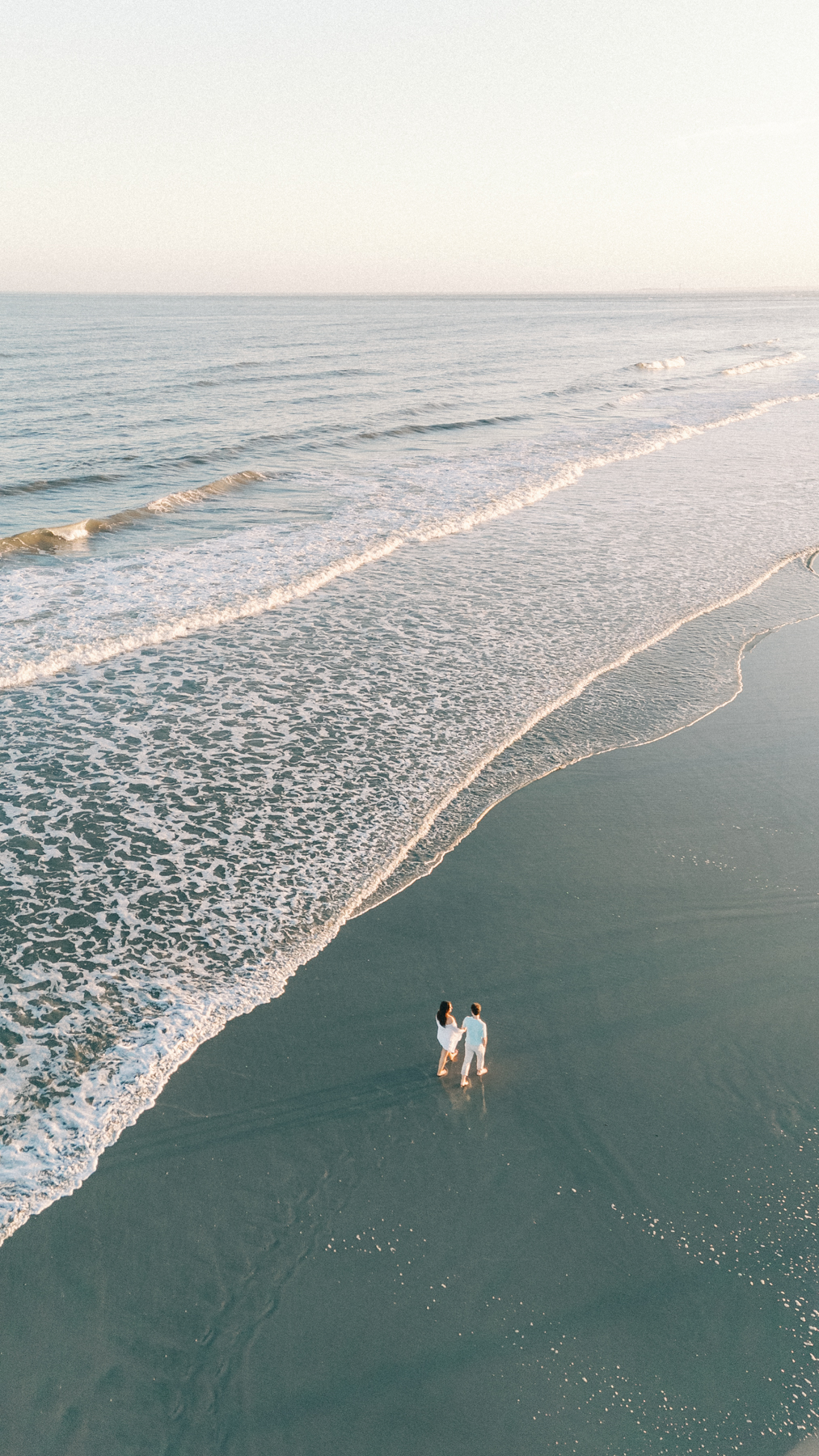 Couple drone shot walking