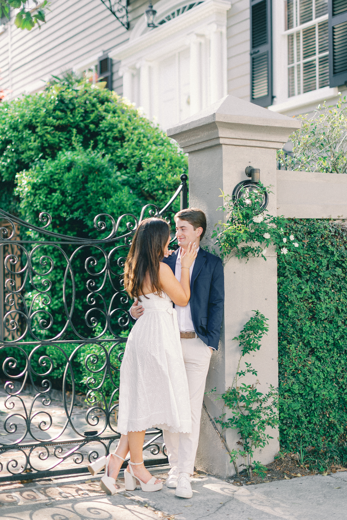 Couple hanging out by garden