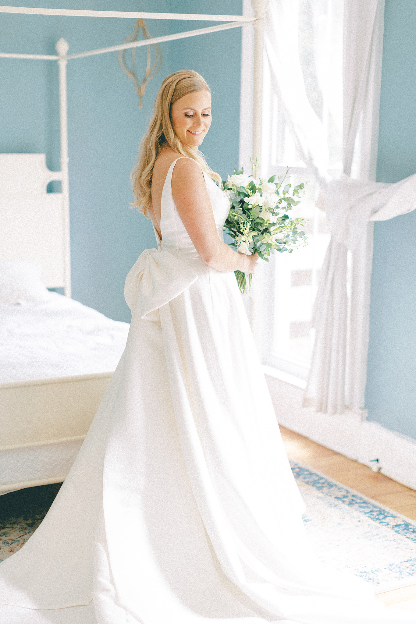 bride in window light during getting ready portraits — northern michigan wedding photography