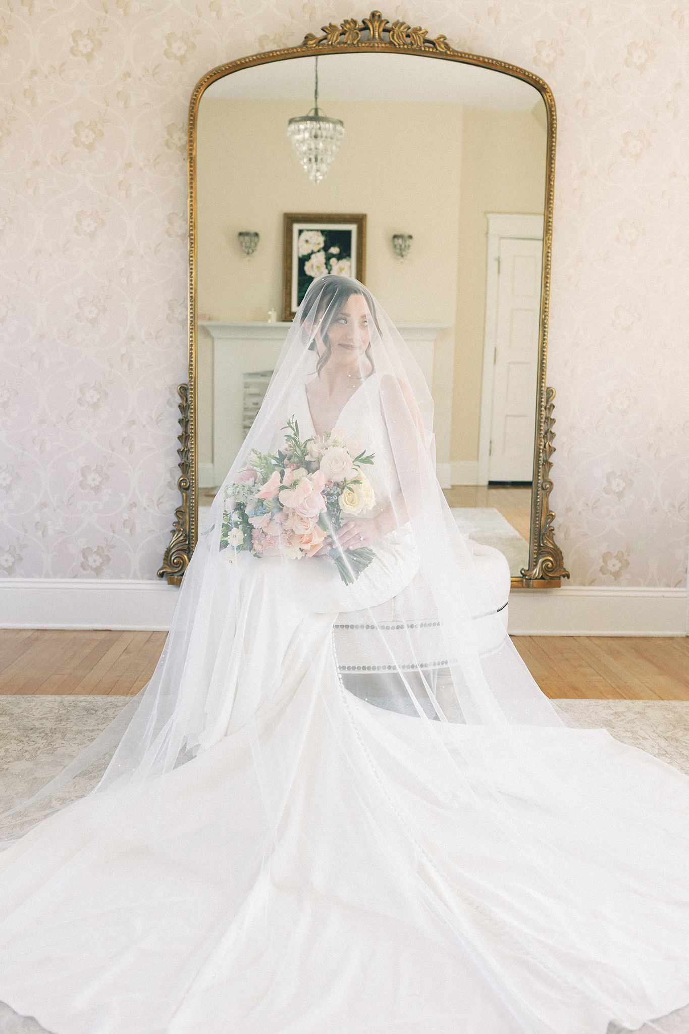 bride getting ready in ornate bridal suite — northern michigan wedding photographer hayley moore