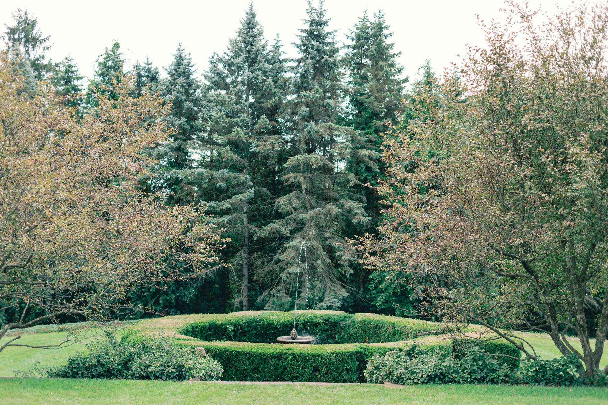 circular hedged fountain garden on the estate grounds at Greencrest Manor Michigan wedding venue